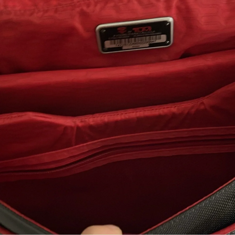 Tumi new, laptop bag.